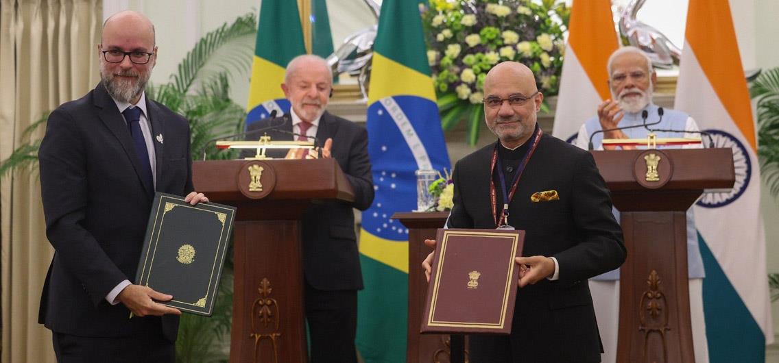 Ambassador Dinesh Bhatia and the President of ANVISA exchanging an MoU during the State Visit of President Lula